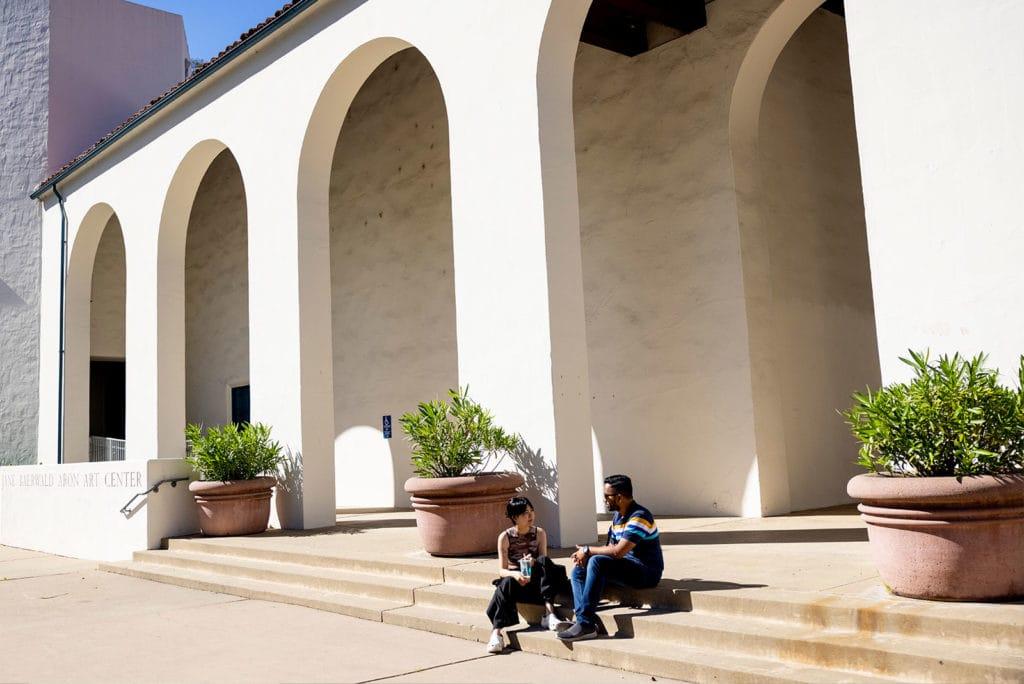 Students sit outside the Mills College Art Museum at the Oakland campus