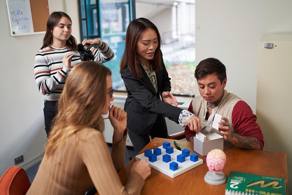 Dr. Chung works with students and cognitive research tools
